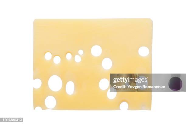 cheese slice isolated on white background - piece stockfoto's en -beelden