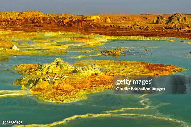 Sulphure rock formations in an acid brine pool, geothermal field of Dallol, Danakil depression, Afar Triangle, Ethiopia .