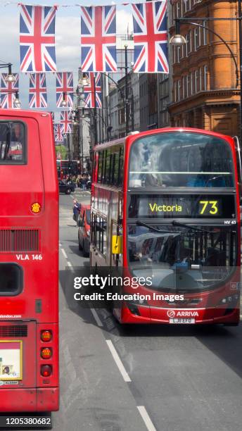 Red double decker buses London England.