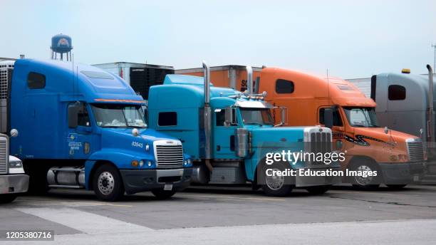 Trucks parked worlds largest truck stop Iowa 80 Walcott Iowa USA.