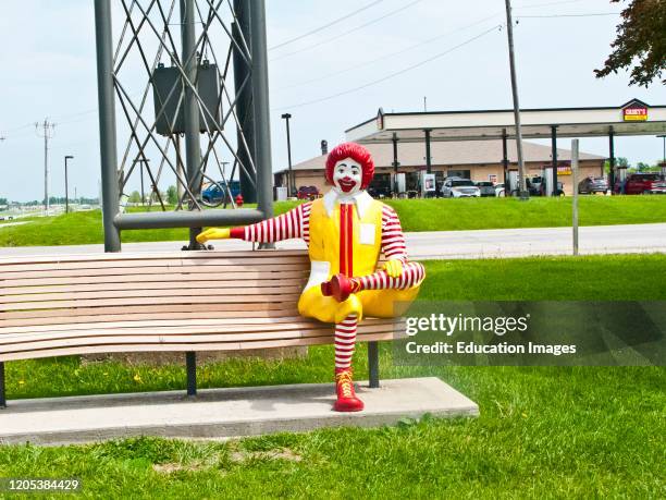 Missouri, Bethany, Ronald McDonald statuary on Bench at McDonald's.