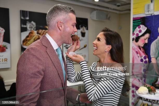 Million Dollar Listing New York stars, Ryan Serhant and Emilia Bechrakis Serhant, shop for Valentine’s Day gifts at the GODIVA café located in NYC’s...