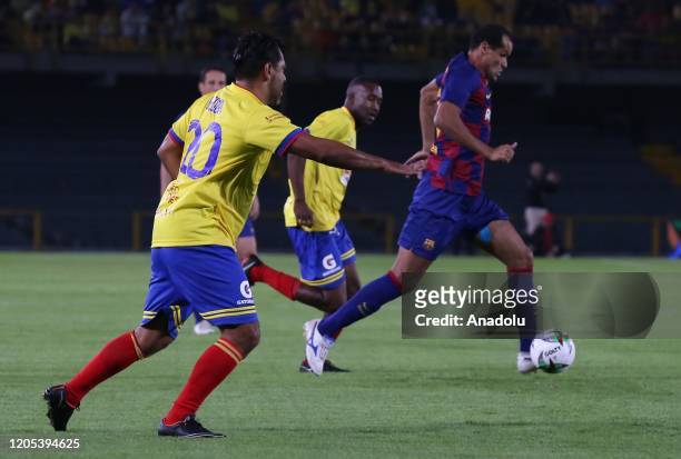 Former Brazilian soccer player from Barca Legends Rivaldo controls the ball against Colombia Legends during a friendly match at El Campin stadium in...