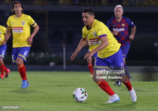 Former Colombian soccer player Giovanni Hernandez controls the ball during the Colombia Legends and Barca Legends friendly match at El Campin stadium...