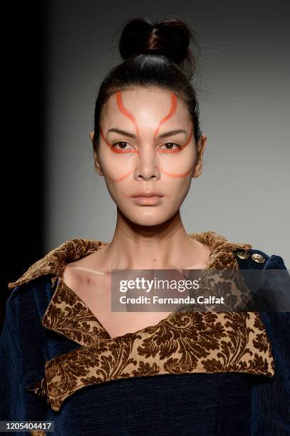 Model walks the runway, makeup detail, for Shun Oyama Tokyo at Global Fashion Collective II during New York Fashion Week: The Shows at Pier 59...