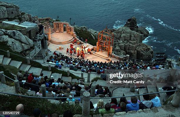 The audience watch Cyrano De Bergerac presented by Shattered Windscreen Theatre Company at the Minack Theatre on August 5, 2011 in Porthcurno,...