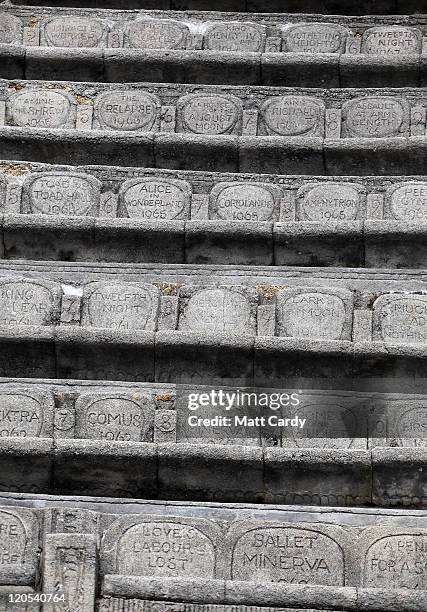 Previous productions are seen carved into the stone as the audience begins to arrive to see Cyrano De Bergerac presented by Shattered Windscreen...