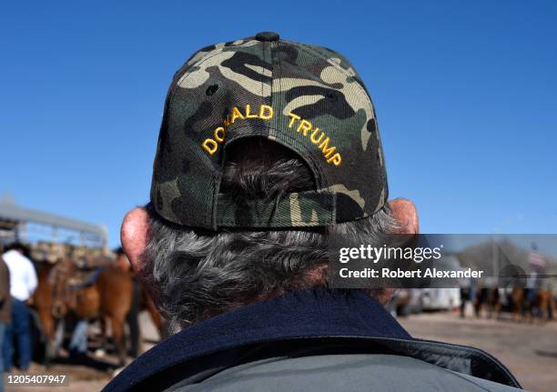 Donald Trump suppporter wears a 'Donald Trump' hat at a pro-Trump rally in Santa Fe, New Mexico.