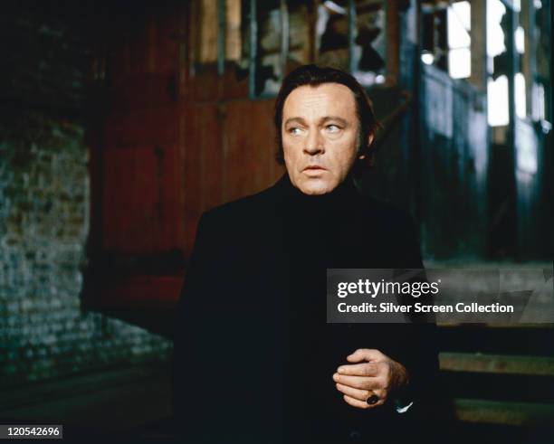 Richard Burton , British actor, wearing black clothing, in a publicity still issued for the film, 'Villain', 1971. The gangster film, directed by...