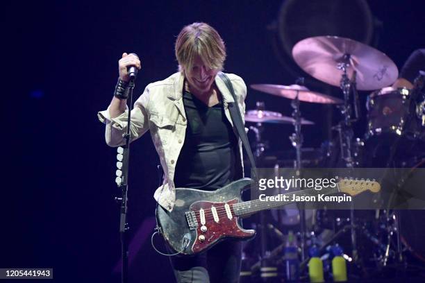Keith Urban performs at All for the Hall: Under the Influence Benefiting the Country Music Hall of Fame and Museum at Bridgestone Arena on February...