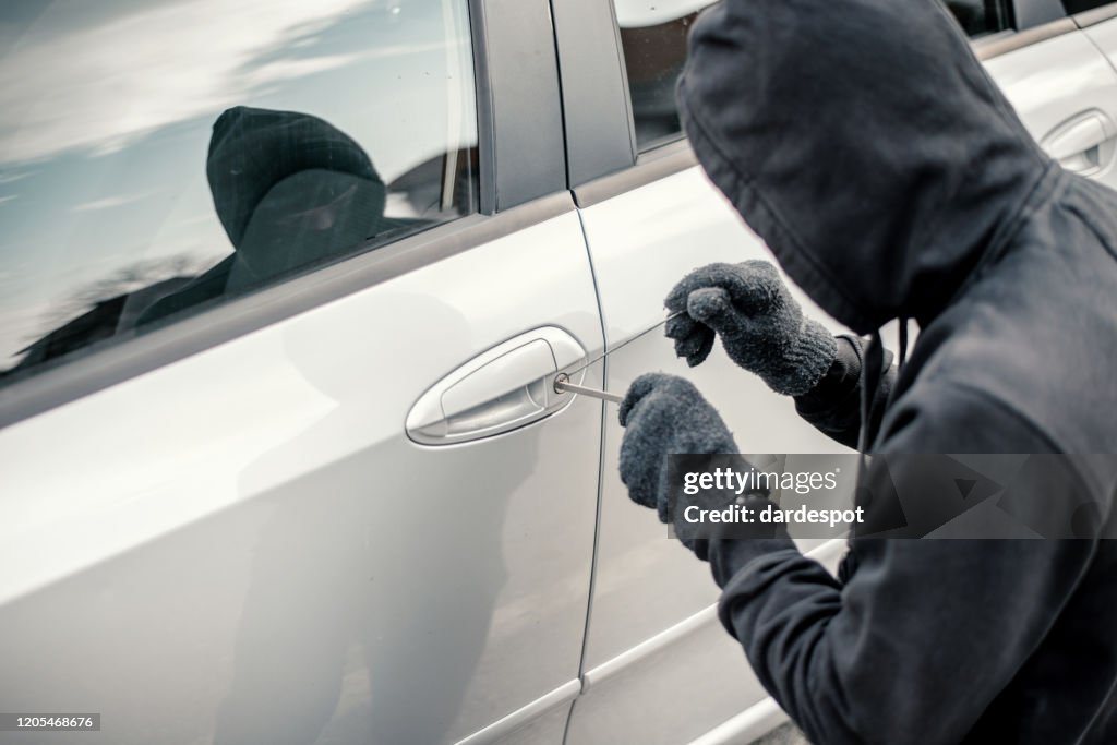 Man stealing a car