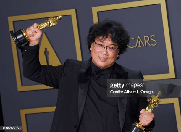 Bong Joon Ho poses with his Award for Best Director, Best Picture inside The Press Room of the 92nd Annual Academy Awards held at Hollywood and...