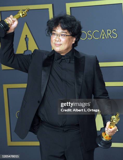 Bong Joon Ho poses with his Award for Best Director, Best Picture inside The Press Room of the 92nd Annual Academy Awards held at Hollywood and...