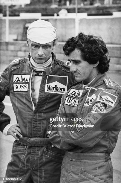 Austrian racing driver Niki Lauda of Team Marlboro McLaren International and French racing driver Alain Prost of Team Marlboro McLaren International...