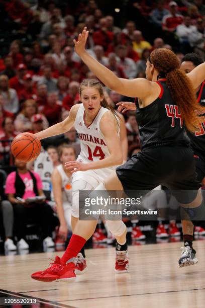 Indiana Hoosiers guard Ali Patberg looks to drive past Rutgers Scarlet Knights center Jordan Wallace during the womens Big 10 Tournament game between...