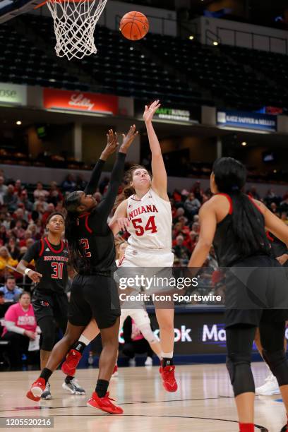 Indiana Hoosiers forward Mackenzie Holmes with the jump hook over Rutgers Scarlet Knights forward Tyia Singleton during the womens Big 10 Tournament...