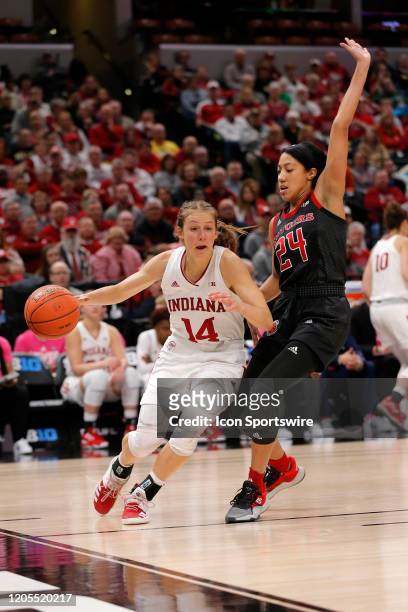 Indiana Hoosiers guard Ali Patberg drives past Rutgers Scarlet Knights guard Arella Guirantes along the baseline during the womens Big 10 Tournament...