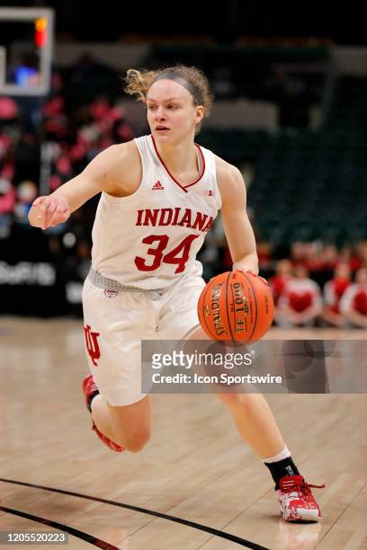 Indiana Hoosiers guard Grace Berger drives along to top of the key during the womens Big 10 Tournament game between the Rutgers Scarlet Knights and...