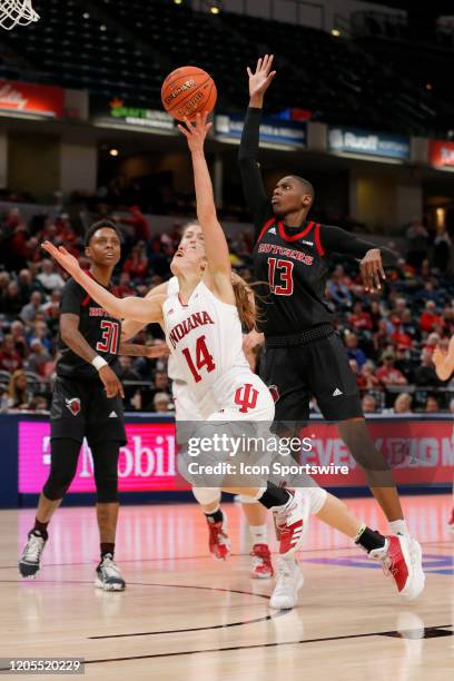 SINDIANAPOLIS, IN Indiana Hoosiers guard Ali Patberg puts up her shot as she drives past Rutgers Scarlet Knights player Tekia Mack during the womens...