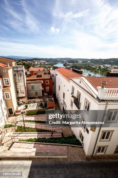 the medieval old town of coimbra in portugal - coimbra district stock-fotos und bilder