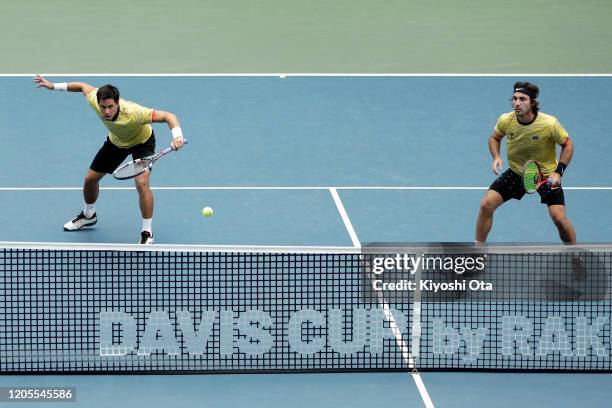 Gonzalo Escobar and Diego Hidalgo of Ecuador play in their doubles match against Ben McLachlan and Yasutaka Uchiyama of Japan on day two of the Davis...
