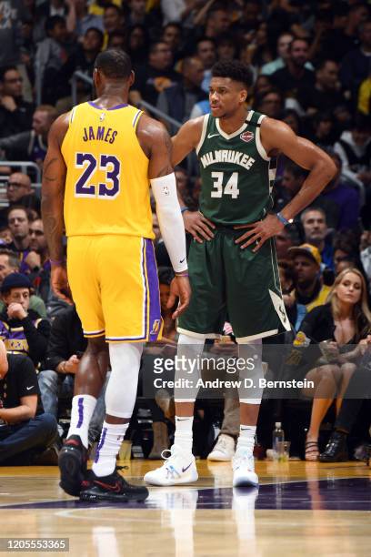 LeBron James of the Los Angeles Lakers and Giannis Antetokounmpo of the Milwaukee Bucks look on during the game on March 6, 2020 at STAPLES Center in...