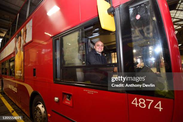 Chancellor of the Exchequer Sajid Javid sits in the drivers seat of a bus as he speaks to a bus driver during a visit to Birmingham Central Bus...