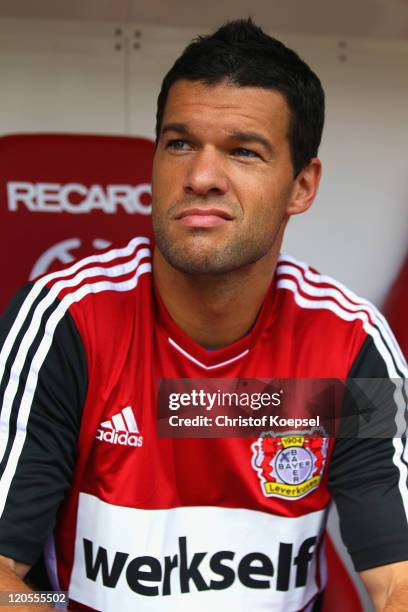 Michael Ballack of Leverkusen sits on the bench during the Bundesliga match between FSV Mainz 05 and Bayer 04 Leverkusen at Coface Arena on August 7,...