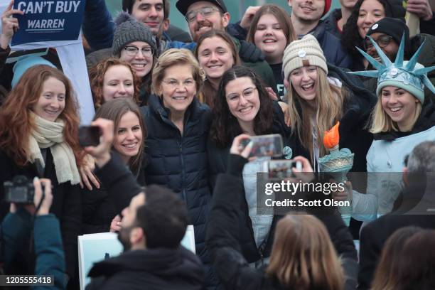 Democratic presidential candidate Sen. Elizabeth Warren visits with supporters on the campus of the University of New Hampshire on February 11, 2020...