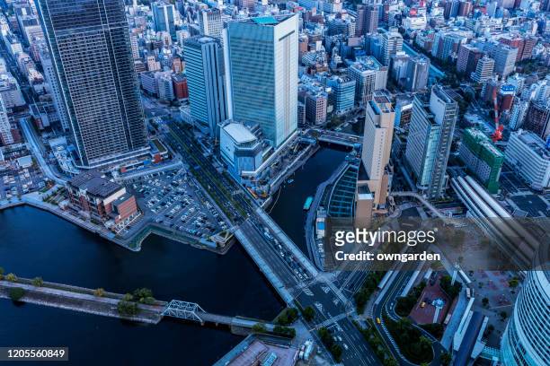 aerial view of yokohama skyline - kanagawa stockfoto's en -beelden