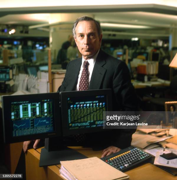 Businessman Michael Bloomberg with a pair of Bloomberg Terminals on October 31, 1997 in New York City, New York.