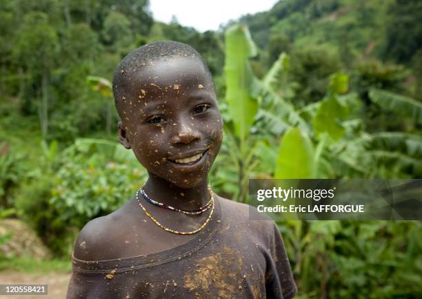 Batwa tribe kid in Cyamudongo village in Rwanda on March 25, 2010 - The Twa, aka the Batwa, are a pygmy people who were the oldest recorded...