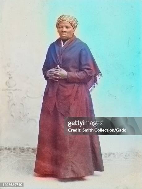 Full length portrait of activist Harriet Tubman in shawl with hands crossed, 1885. Courtesy Library of Congress. Note: Image has been digitally...