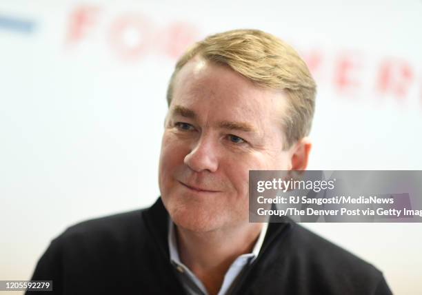 Democratic presidential candidate Michael Bennet speaks with supporters at his New Hampshire headquarters on February 11, 2020 in Nashua, New...