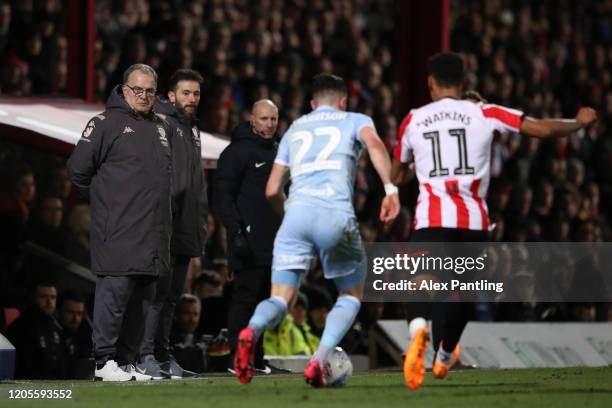 Leeds manager Marcelo Bielsa watches the action as Jack Harrison of Leeds United battles with Ollie Watkins of Brentford during the Sky Bet...