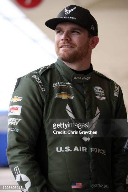 Conor Daly, driver of the U.S. Air Force Chevrolet, stands in the garage area at Circuit of The Americas on February 11, 2020 in Austin, Texas.