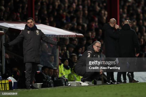 Leeds manager Marcelo Bielsa and Pablo Quiroga react during the Sky Bet Championship match between Brentford and Leeds United at Griffin Park on...