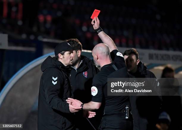 Manager of Fleetwood Town, Joey Barton reacts as he receives red card from referee Kevin Johnson during the Sky Bet League One match between Wycombe...