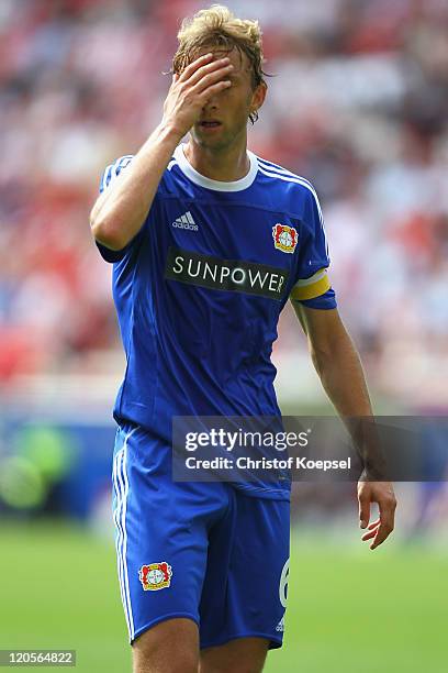 Simon Rolfes of Leverkusen looks dejected during the Bundesliga match between FSV Mainz 05 and Bayer 04 Leverkusen at Coface Arena on August 7, 2011...