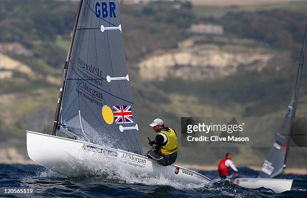 Ben Ainslie of Great Britain in action during a Finn Class race during day six of the Weymouth and Portland International Regatta at the Weymouth and...