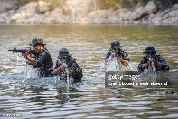 soldier, command's soldiers take part in a sea infiltration against possible threats - us marine corps stock pictures, royalty-free photos & images