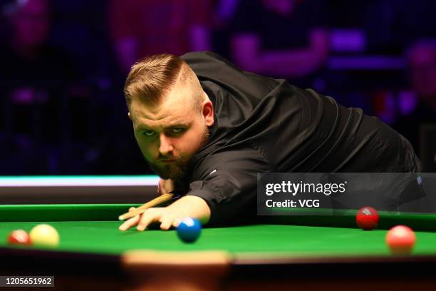 Jackson Page of Wales plays a shot during the 1st round match against Kyren Wilson of England on day two of the 2020 ManBetX Welsh Open at the...