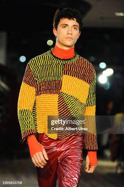 Jacob Bixenman walks the runway for the Eckhaus Latta fashion show during February 2020 - New York Fashion Week: The Shows on February 11, 2020 in...