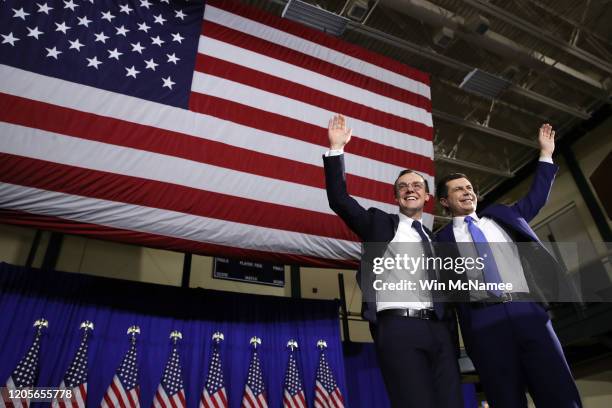 Democratic presidential candidate former South Bend, Indiana Mayor Pete Buttigieg appears on stage with his husband Chasten Buttigieg at his primary...