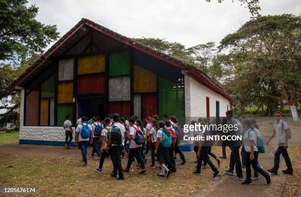 Students arrive for a mass in honour of Nicaraguan late poet Ernesto Cardenal in Solentiname, Rio San Juan, Nicaragua, on March 7, 2020. - Cardenal,...