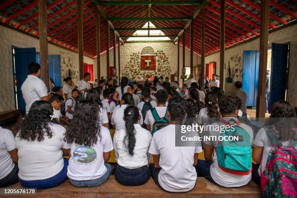 Students attend a mass in honour of Nicaraguan late poet Ernesto Cardenal in Solentiname, Rio San Juan, Nicaragua, on March 7, 2020. - Cardenal,...
