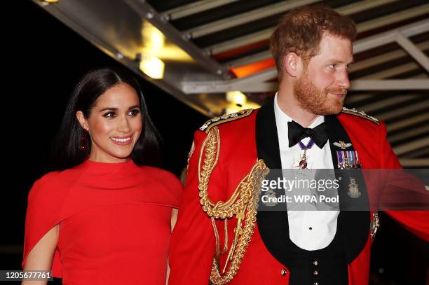 Prince Harry, Duke of Sussex and Meghan, Duchess of Sussex arrive to attend the Mountbatten Music Festival at Royal Albert Hall on March 7, 2020 in...