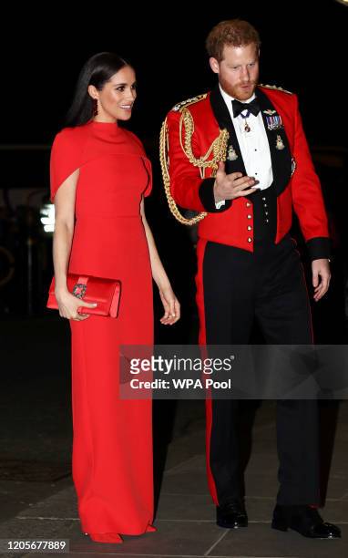 Prince Harry, Duke of Sussex and Meghan, Duchess of Sussex arrive to attend the Mountbatten Music Festival at Royal Albert Hall on March 7, 2020 in...