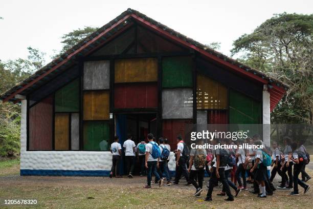 March 2020, Nicaragua, Solentiname: A group of students enters the Catholic Church on the island of Mancarron to attend a mass in honour of the poet...
