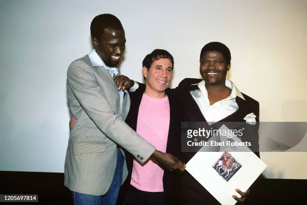 Albert Mazibuko, Paul Simon and Joseph Shabalala at a news conference announcing the release of Simon's 'Graceland' album in New York City on August...